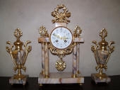 Gold Leaf Gilding to French Antique Clock & Ornaments